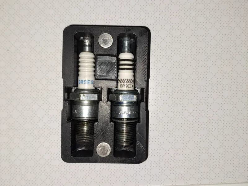 Spark plug holder
