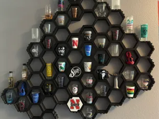 Wall mounted hexagon shelves / Shot glass display