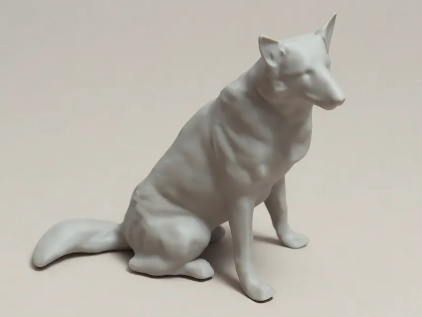Figurine réaliste de chien assis