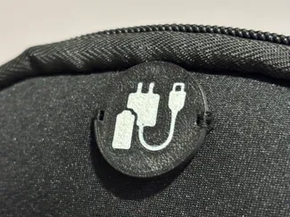 Charge cable badge/button for pouch/bag