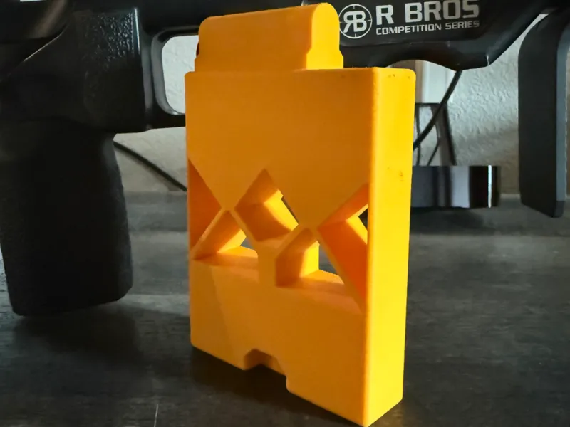 AICS bolt-action magwell safety block
