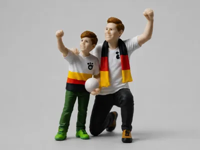 cheering father-son fan duo for LGB garden railway