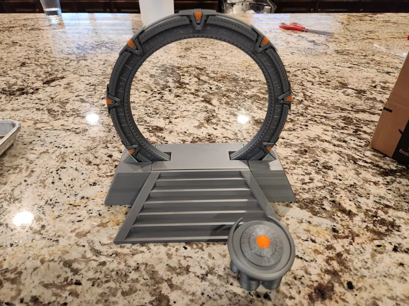 Stargate in an off-world pedestal with a DHD