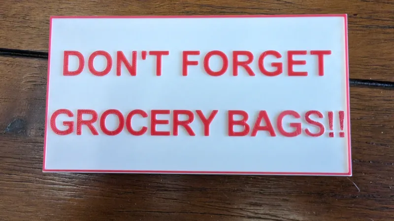 Don't forget grocery bags sign