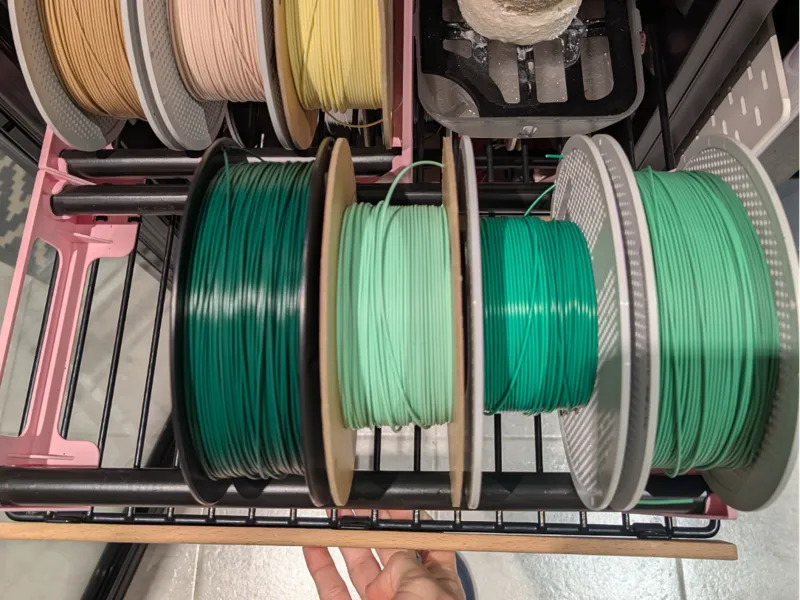 Spool holder for wine cellar