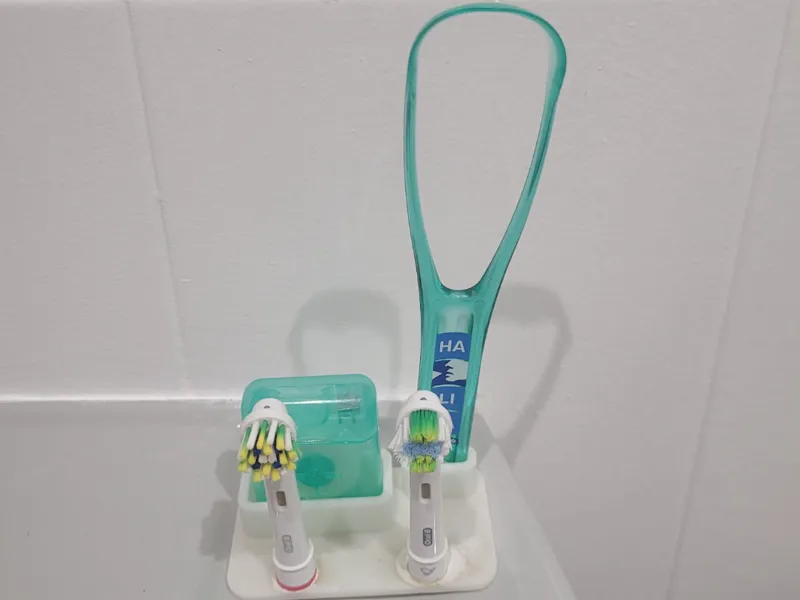 Porta cepillos oralb + hilo dental+rascador lengua