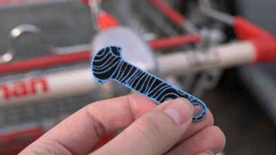 Shopping cart unlocker keychain for AMS