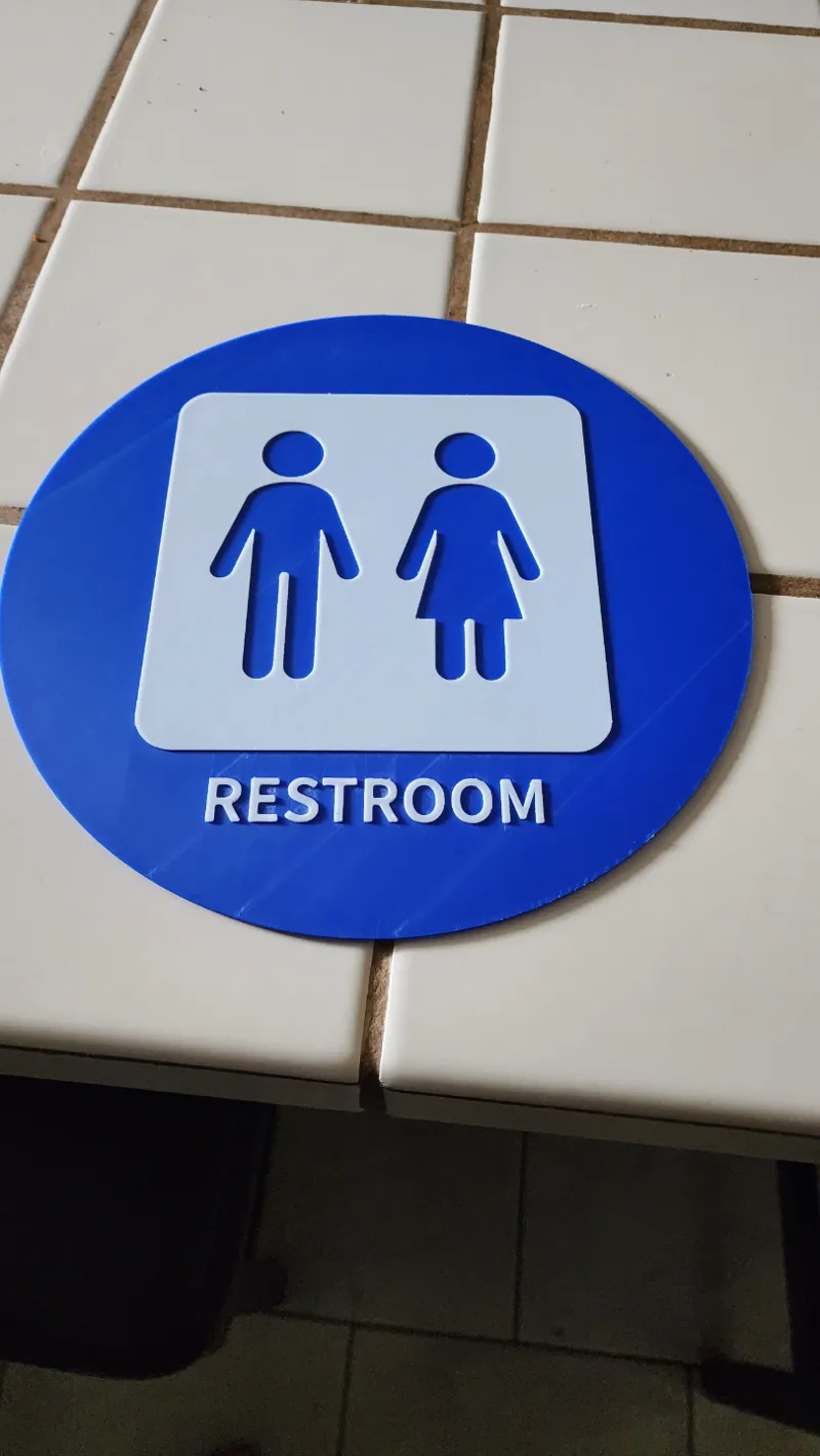 Round Restroom Sign