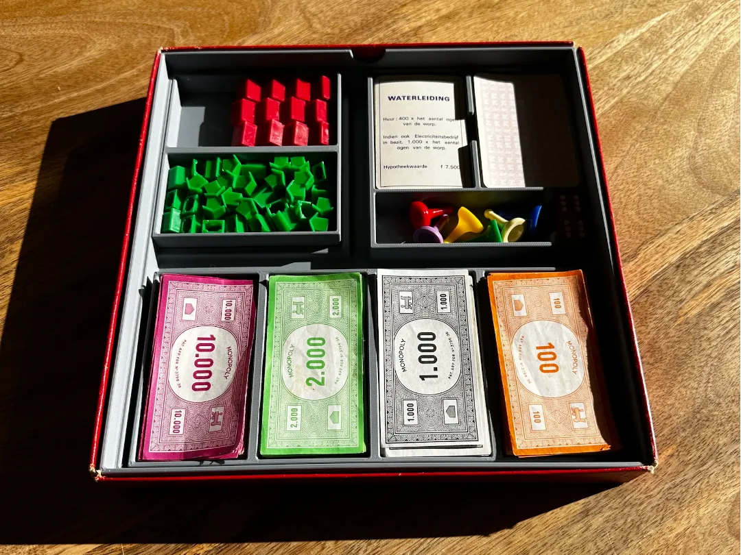 Rangement intérieur pour boîte de jeu Monopoly