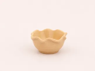 A bowl suitable for a dollhouse.