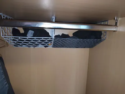 slim hanging basket for above clothing hangers