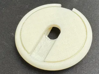 Rotating print in place light blocking cover