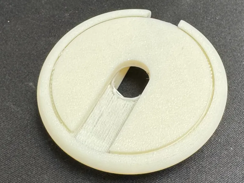 Rotating print in place light blocking cover