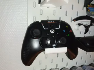 SKADIS porte manette/écouteur
