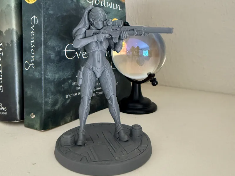Female Space Marine Sniper Aiming Down Range