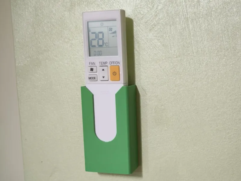 Supporto per telecomando a muro