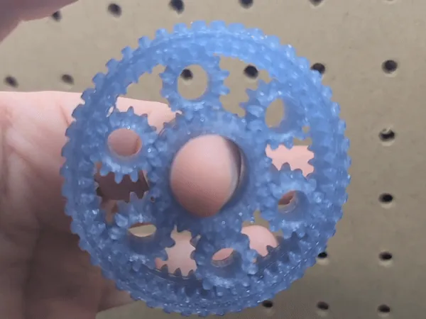 Toupie fidget à engrenages planétaires