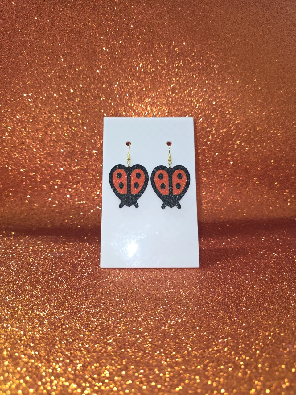 Buglove earrings view 2