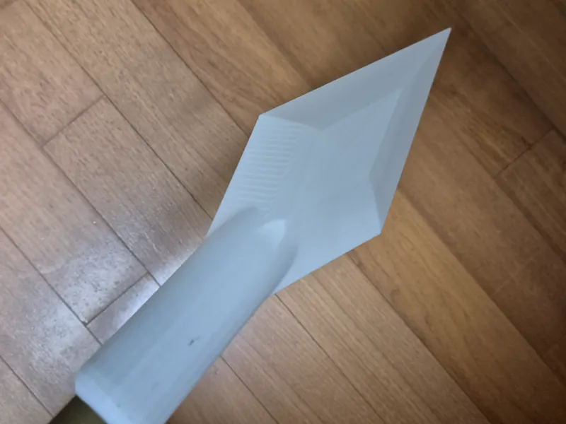 a spear blade mounted on a rod