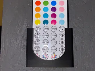 Wall mounted LED strip remote holder