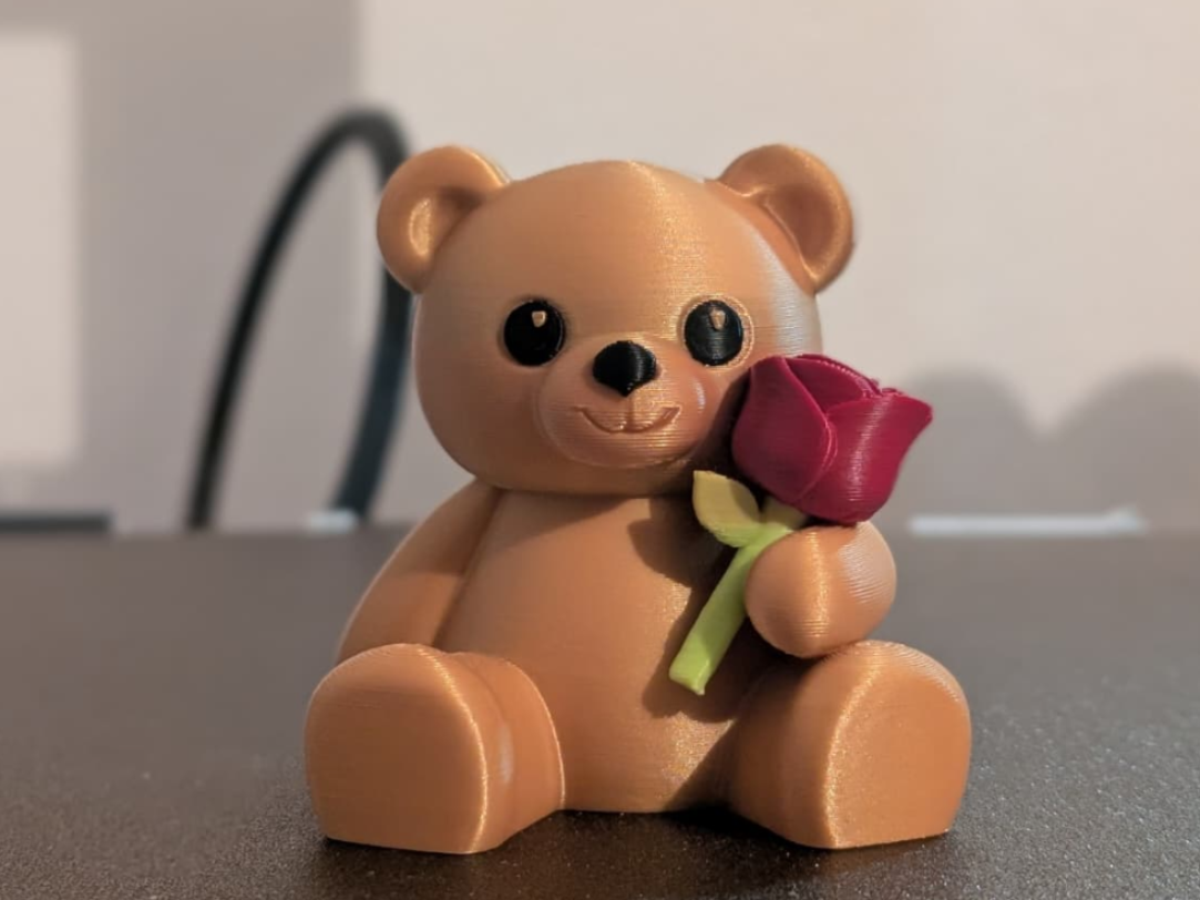 Valentine's Teddy Bear With A Rose