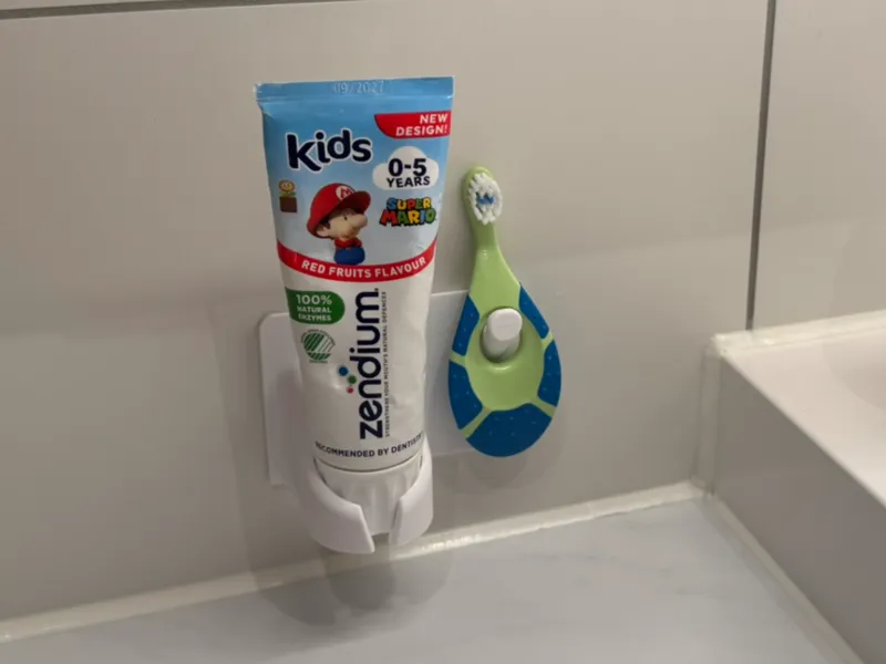 Childrens toothpase and toothbrush wall mound