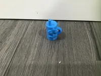 Mini figurine souriante à poignée — photo 1