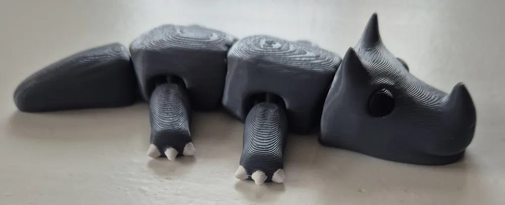 Cute Articulated Rhino - Free 3D Print Model - MakerWorld