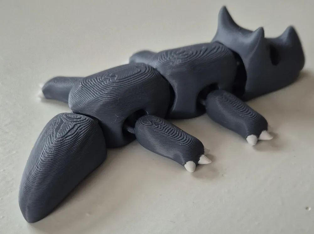 Cute Articulated Rhino - Free 3D Print Model - MakerWorld