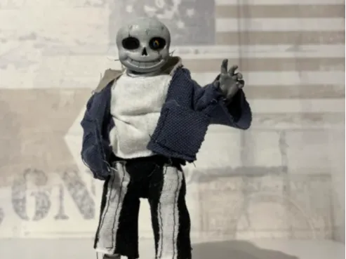 Sans articulated figure and accessories