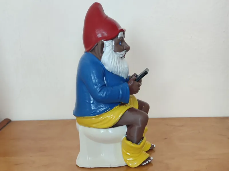 dwarf on the toilet