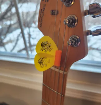 Guitar Pick Holders for strings or pickguard