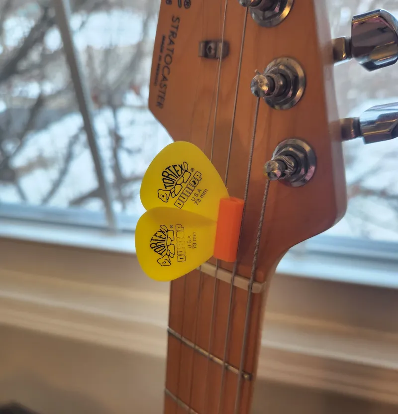 Guitar Pick Holders for strings or pickguard