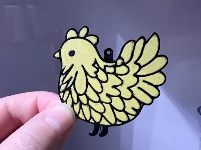 cute chicken keychain or earrings