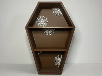 Coffin shelf with spider webs