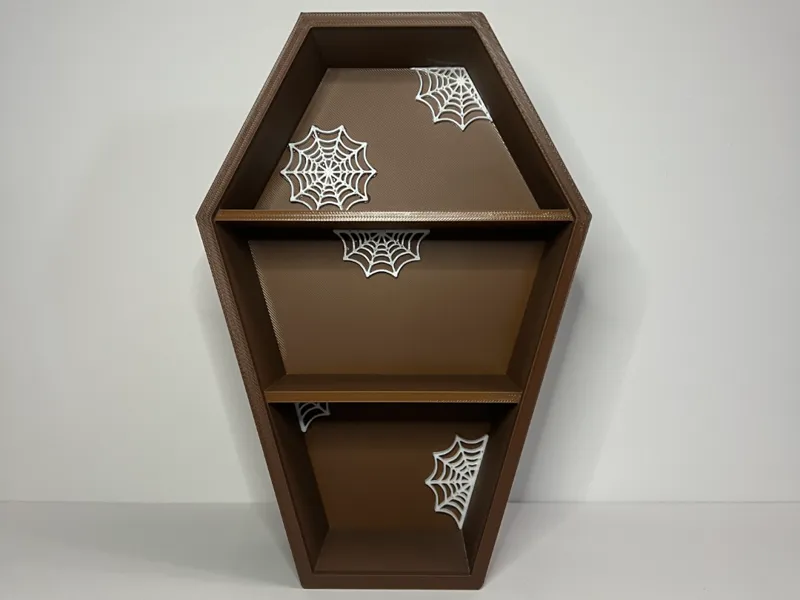 Coffin shelf with spider webs