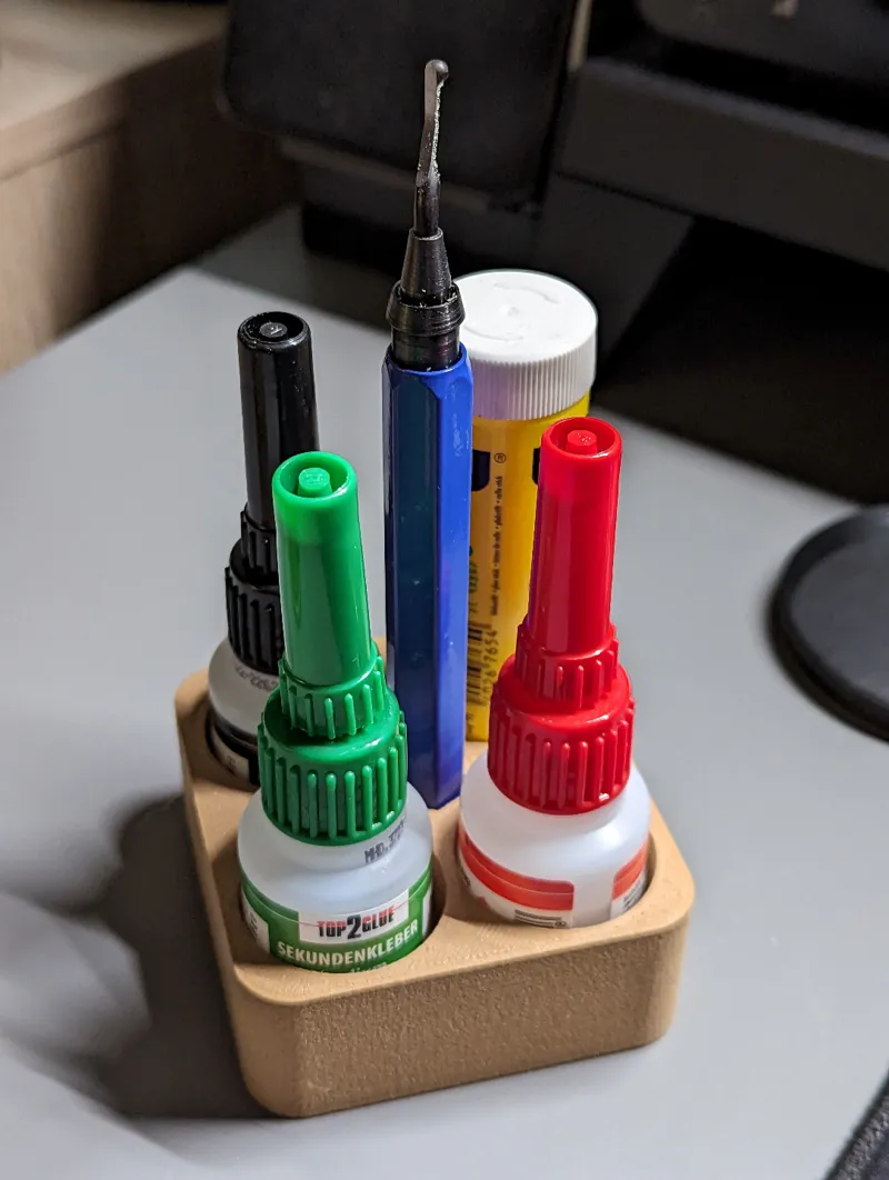 Organizer for glue bottles, glue stick an deburring tool