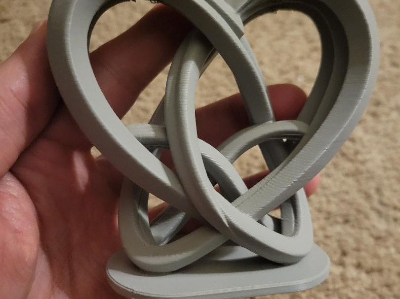 Infinite Love Knot – Intertwined Heart Sculpture