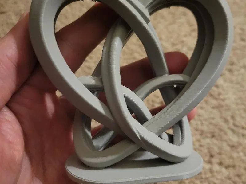 Infinite Love Knot – Intertwined Heart Sculpture