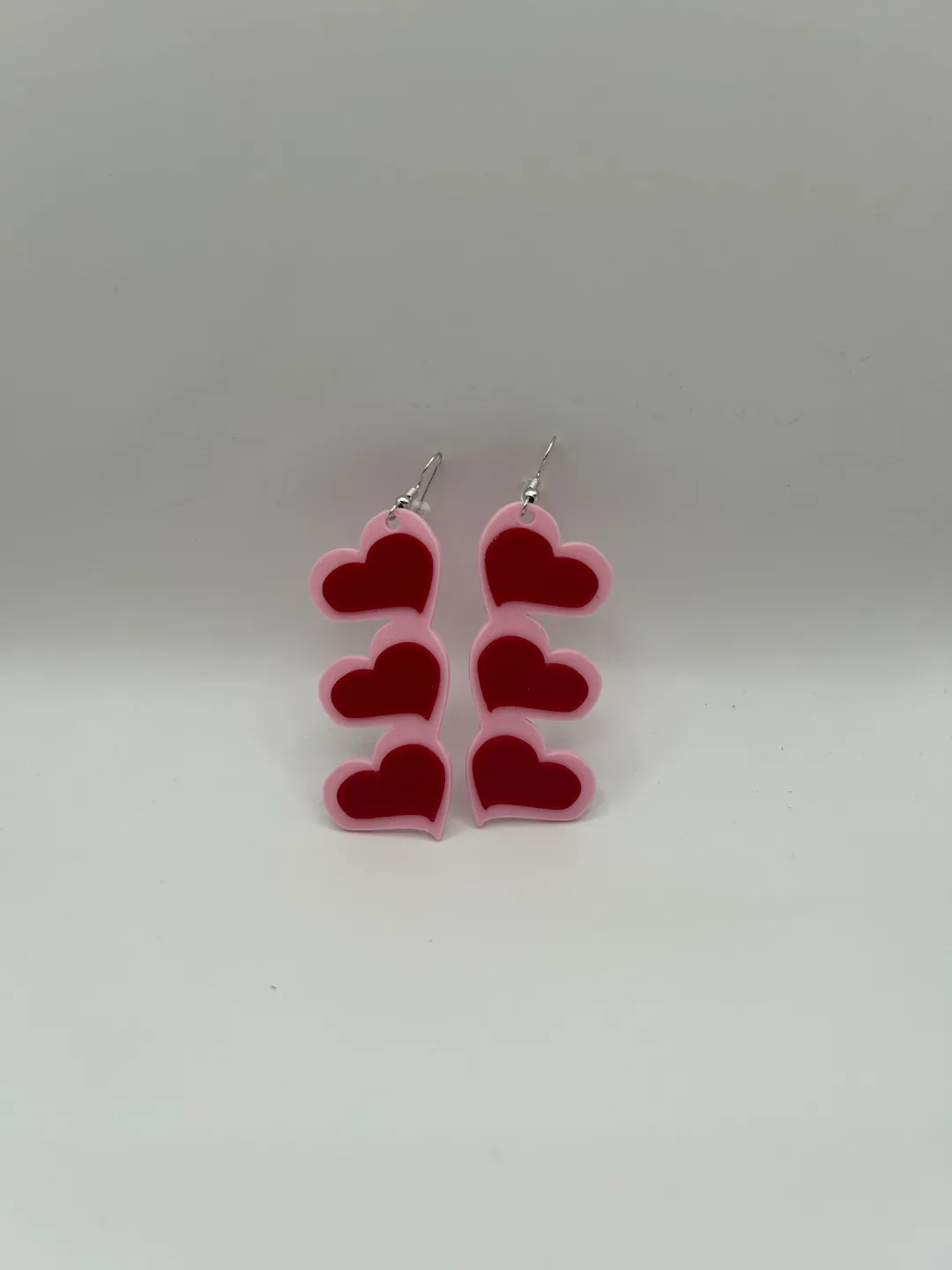 Triple Raised Heart Earrings view 2