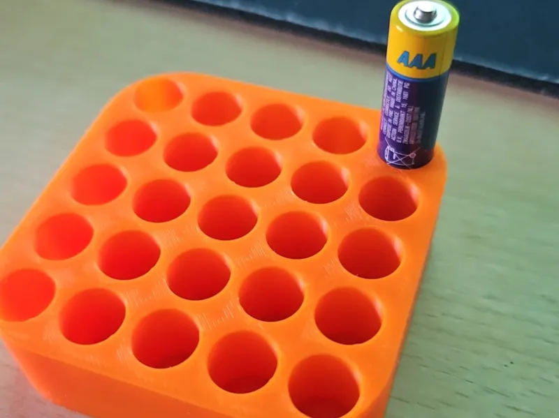 Simple AAA battery holder