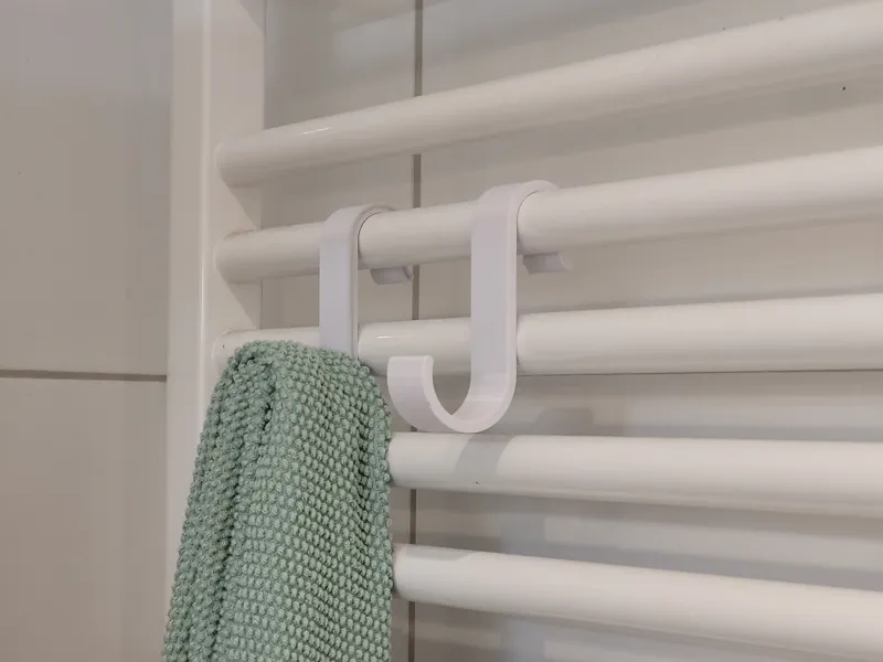 Towel hook for bathroom radiator