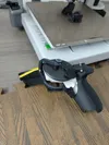If you want to use the grip linkage piece, please print the case from plate two; if you don't want to use the grip linkage piece, you don't have to print plate two and can delete the linkage piece from plate one
