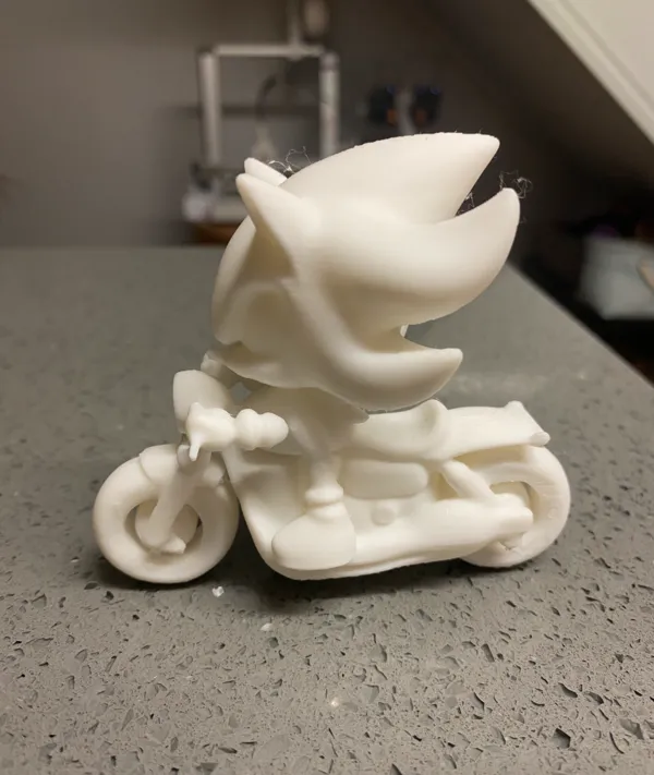 Shadow sur moto, figurine