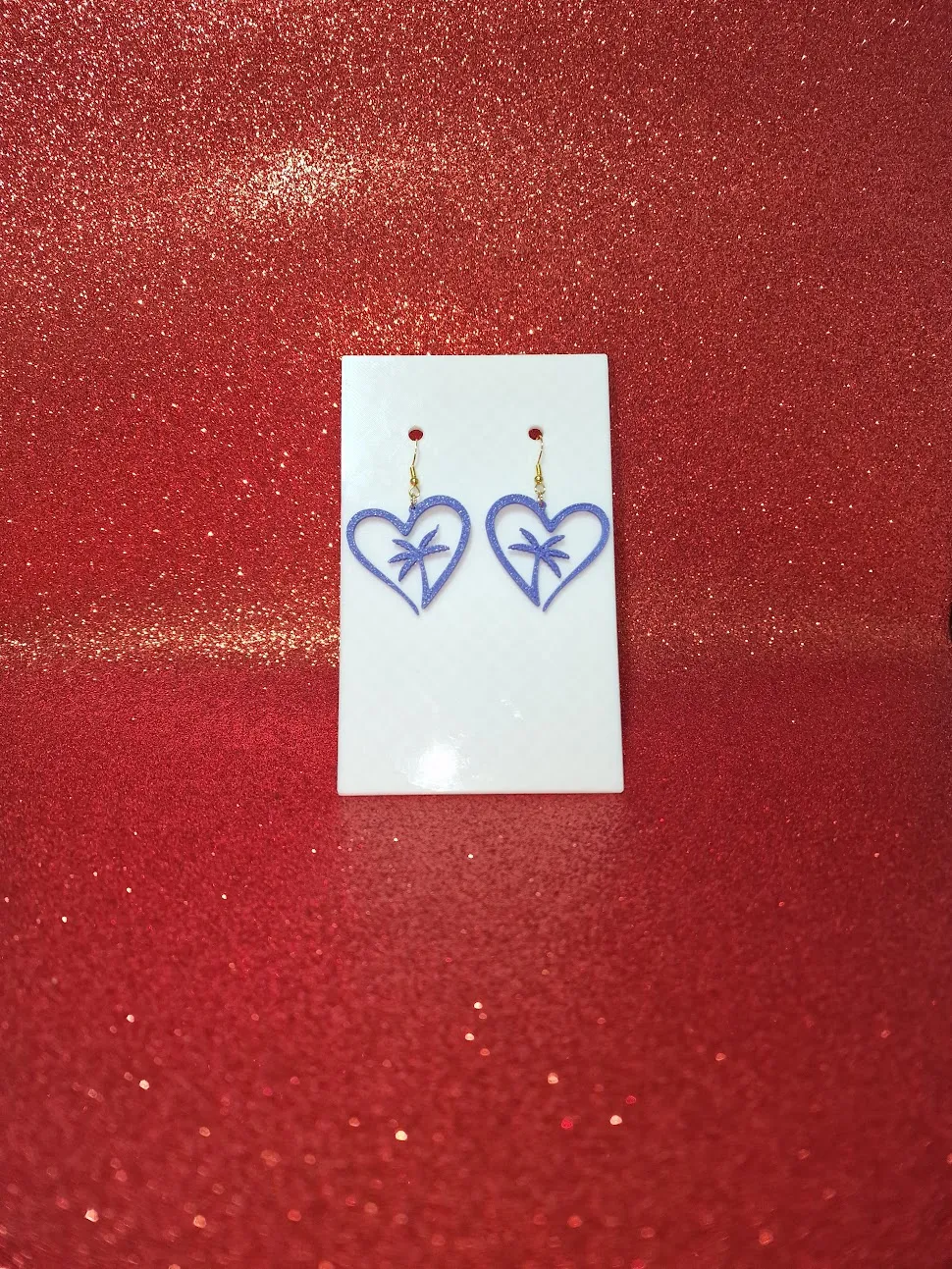 Heart palm earrings view 2