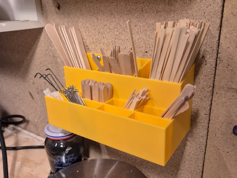 Wall mounted stirring stick storage