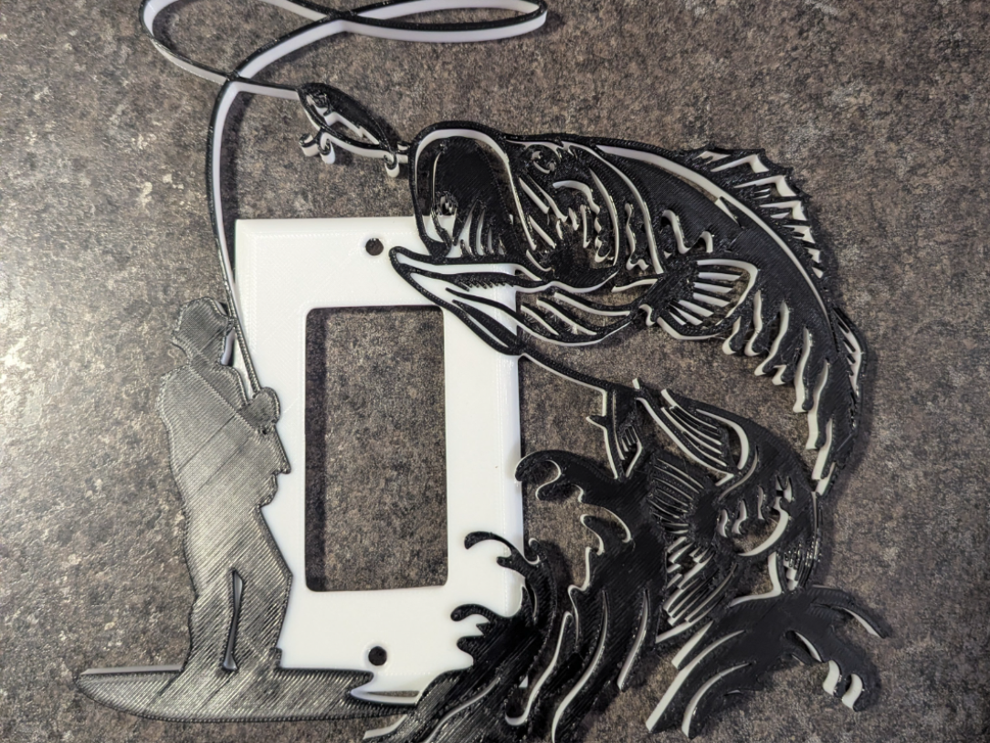 Bass fishing wide light switch cover