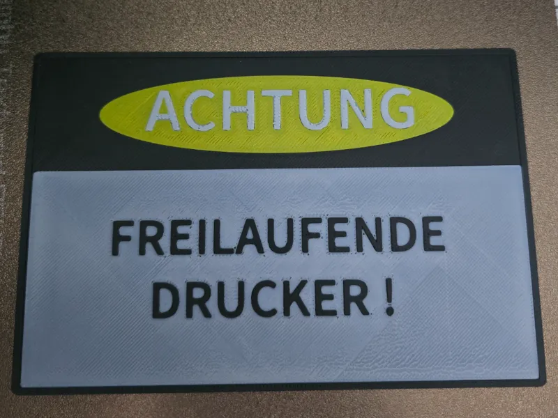 ACHTUNG Freilaufende Drucker Schild
