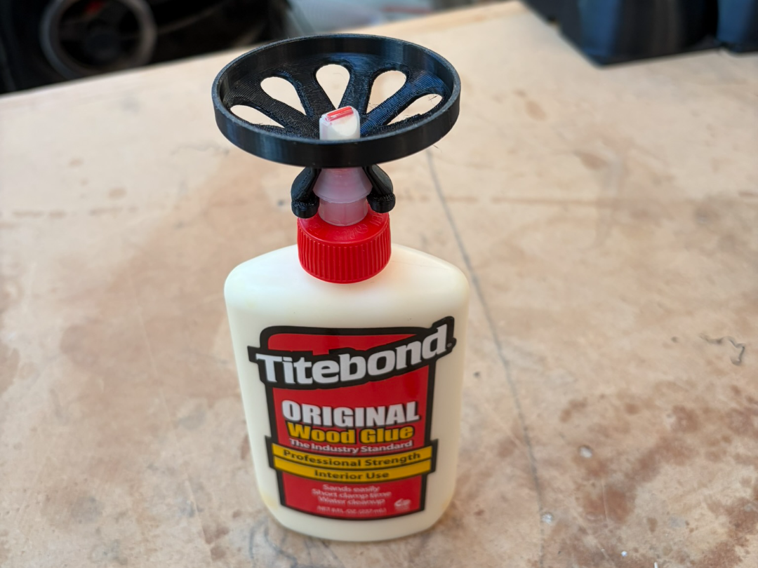 Glue stand with easy open top