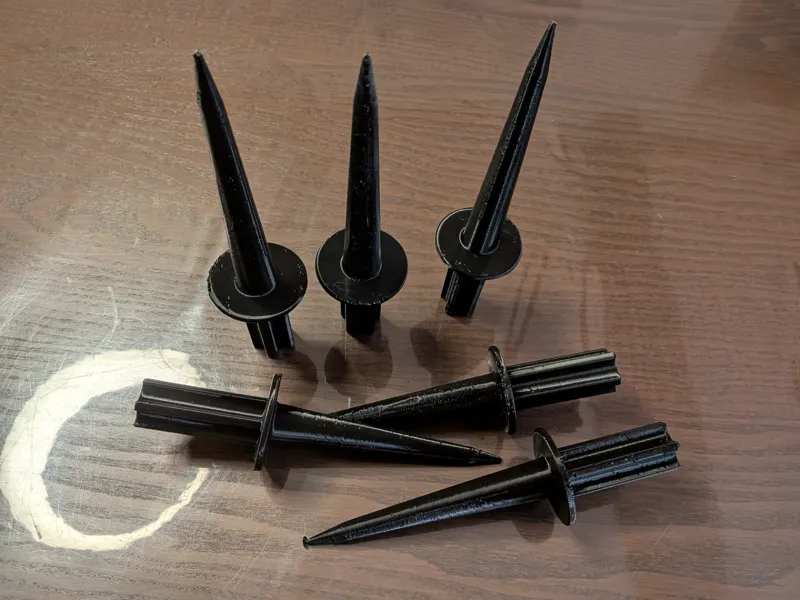 Volleyball net poles spikes